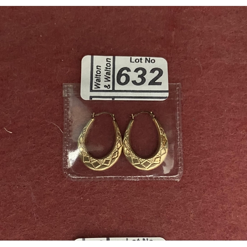 632 - Pair of 9ct gold hinged earrings