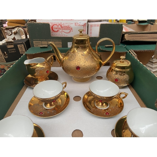 103 - Box containing ornate Bavarian 'gold' tea service