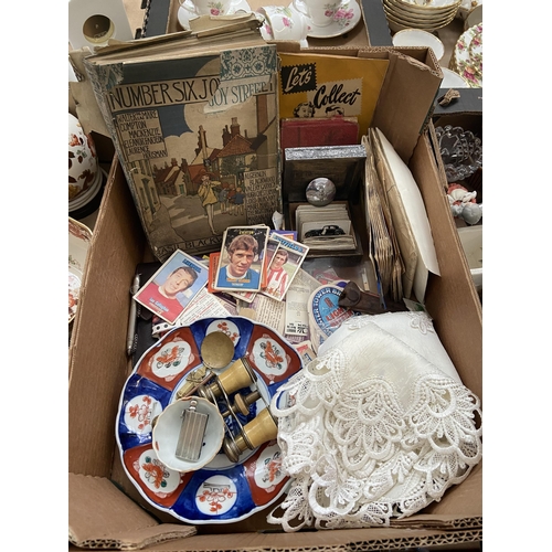 114 - Box containing vintage books, football cards and curios
