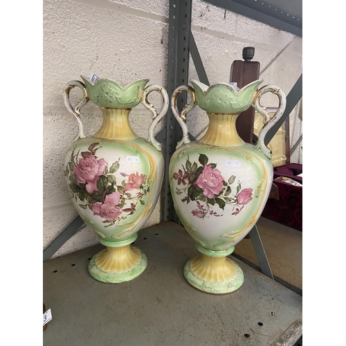 44 - Pair of floral B&K vases (cracked handle)