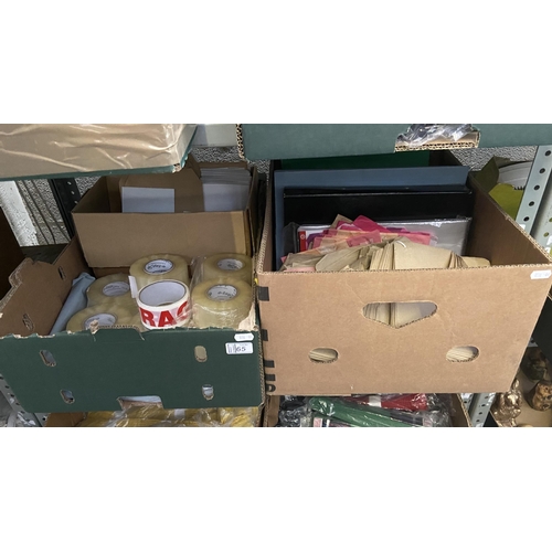 65 - 2 Boxes containing packaging materials