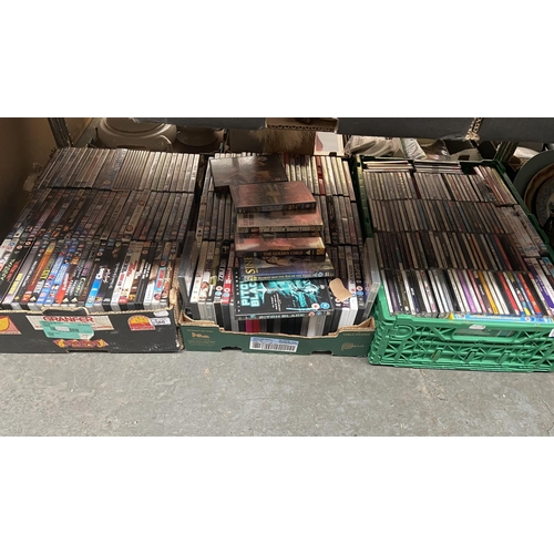 86 - 3 Boxes containing DVDs