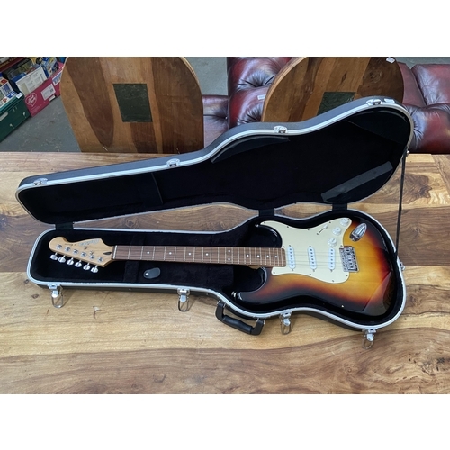 558 - Electric guitar and case