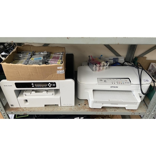 184 - An Epson and a Ricoh printer, and a quantity of ink