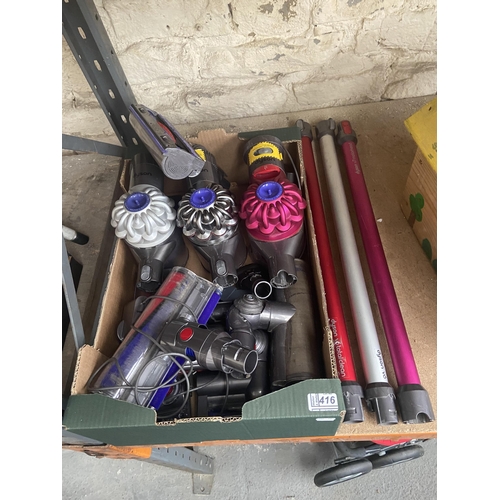 416 - Box containing Dyson vacuums and accessories