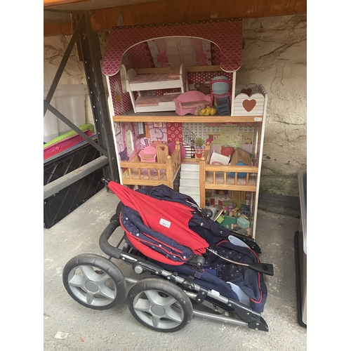 421 - Open dolls house with contents and a baby stroller