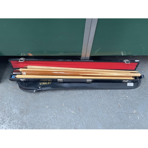 612 - A quantity of snooker and pool cues