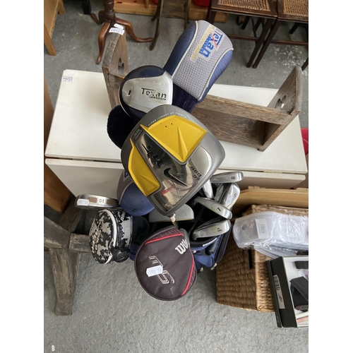 374 - Golf bag and clubs