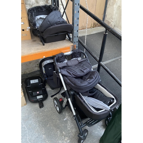 463 - Silvercross pram with carry cot, mittens and other accessories