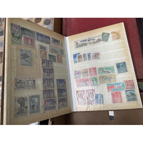 572 - Box containing worldwide stamp albums and first day covers