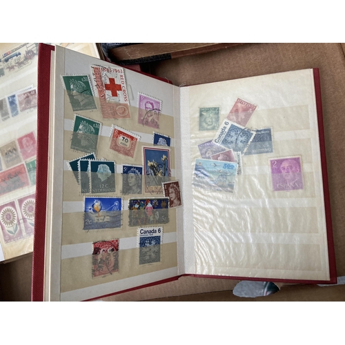 572 - Box containing worldwide stamp albums and first day covers