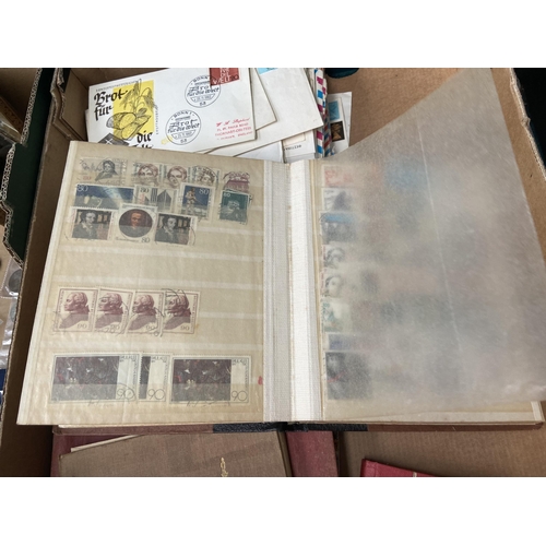 572 - Box containing worldwide stamp albums and first day covers