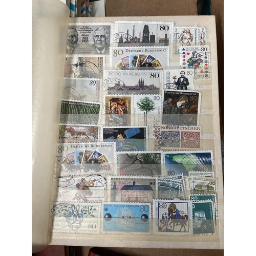 572 - Box containing worldwide stamp albums and first day covers