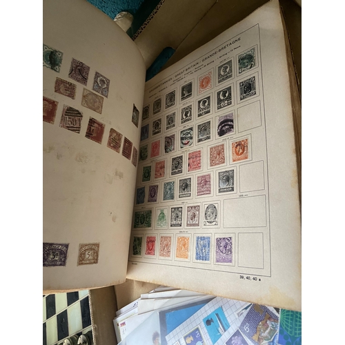 583 - Box containing first day cover, stamps on paper and a Europa album