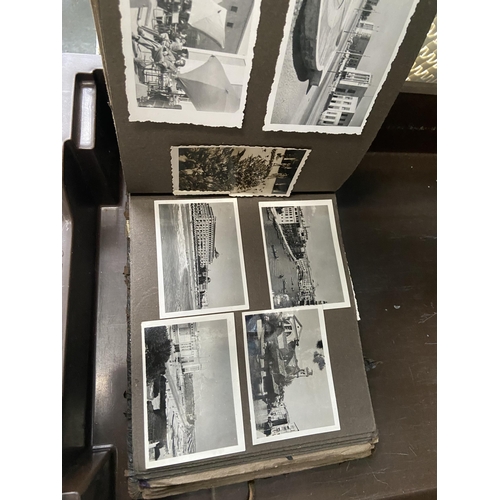 607 - An album containing vintage photographs including military