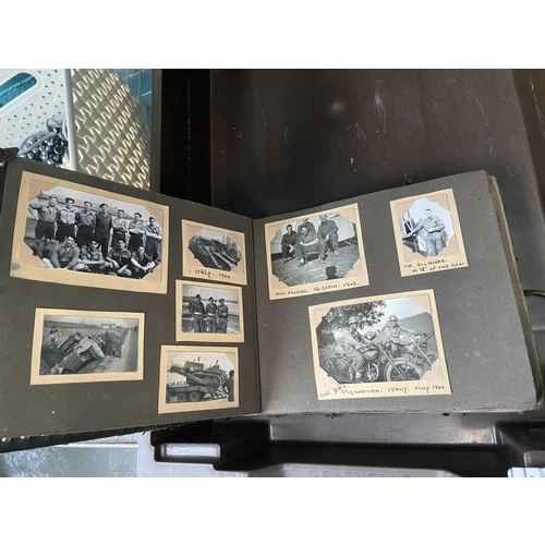 607 - An album containing vintage photographs including military