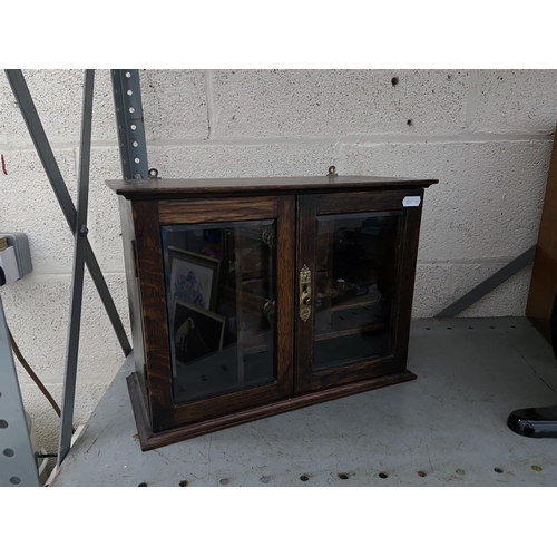 2 - Small glazed collector's cabinet