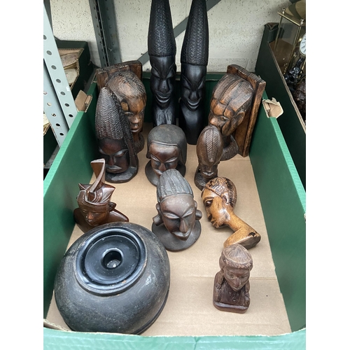 48 - Box containing hand carved African wooden busts and bookends