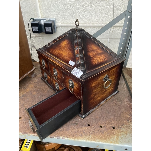 62 - An unusual 'lion head' storage chest