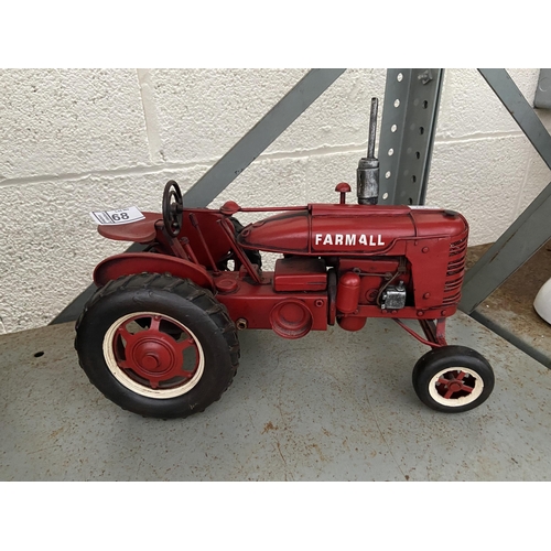 68 - 2 Large tin tractor models