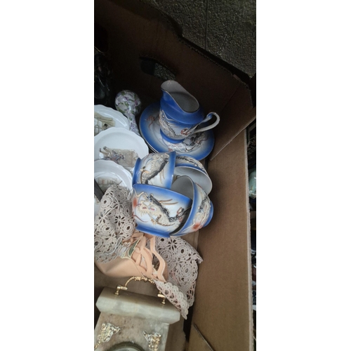 58 - 2 Boxes containing Japanese tea cups, mantle clock and mud men etc