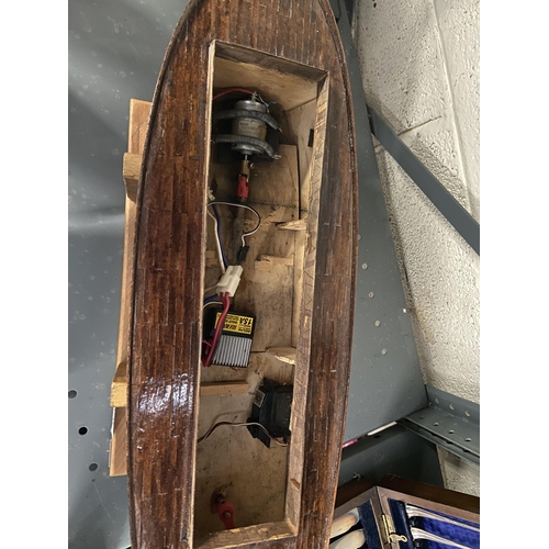 20 - Wooden boat with motor