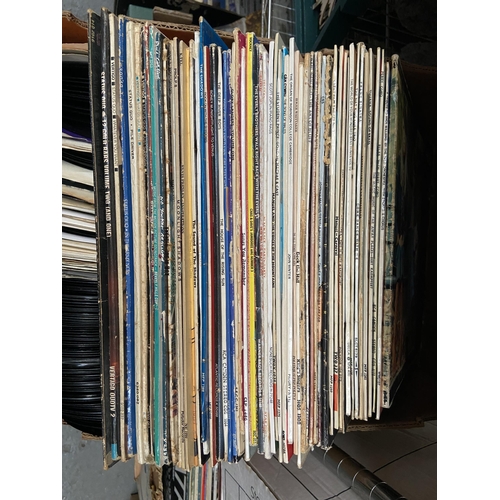 94 - Box containing LPs and singles including Status Quo