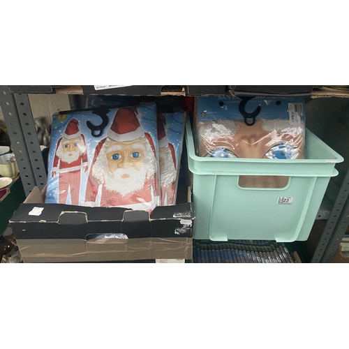 23 - 2 Boxes containing novelty Santa outfits