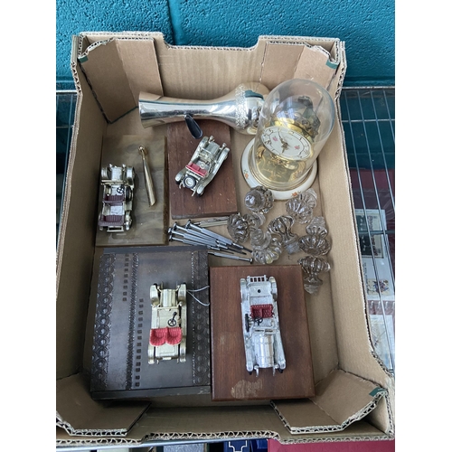 654 - Box containing trinket boxes with mounted vehicles and glass door knobs etc