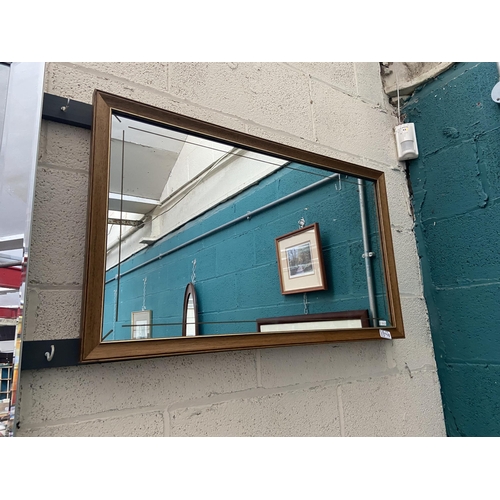 718 - Wooden framed mirror