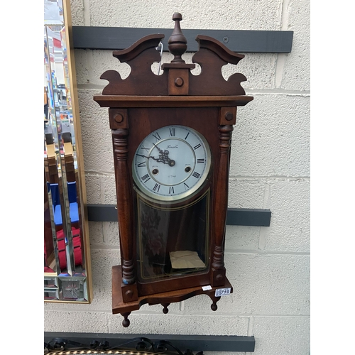 719 - Cased Lincoln wall clock