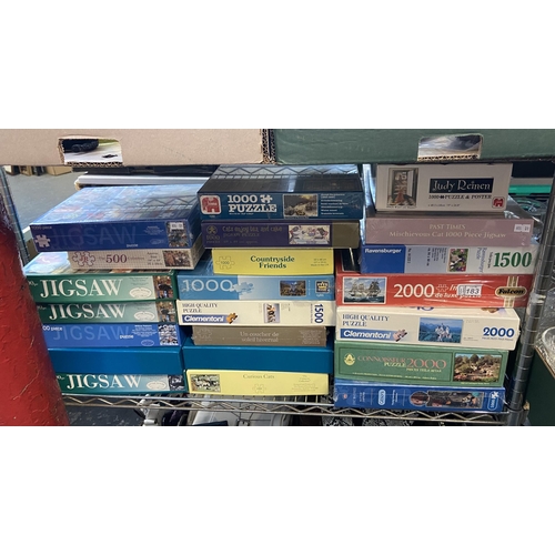 183 - Large quantity of jigsaw puzzles