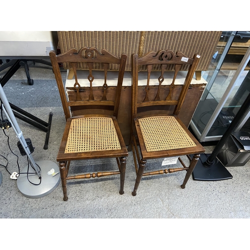 299 - Pair of rattan seated chairs