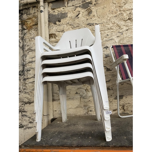 338 - 4 Plastic garden chairs