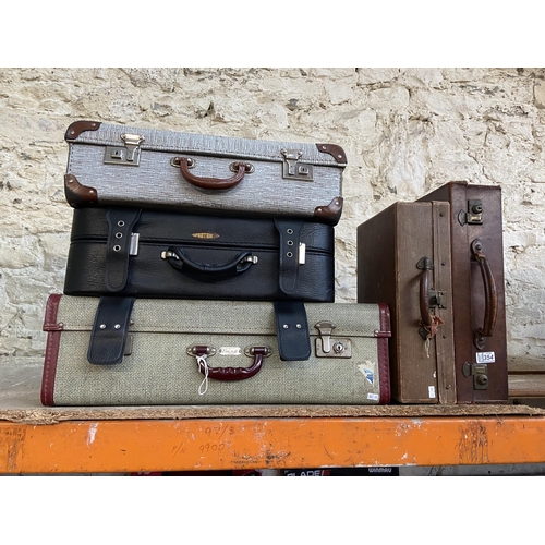 354 - 5 Vintage suitcases