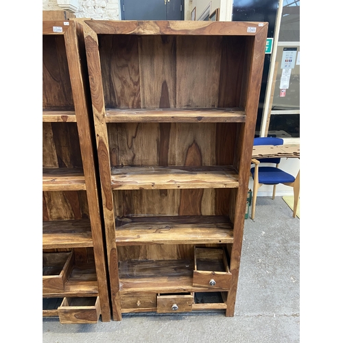 385 - Tall hardwood bookshelf with drawers