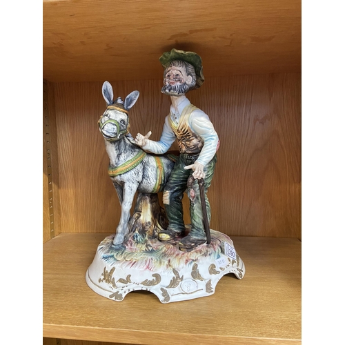 390 - Capodimonte figure of an old man with donkey