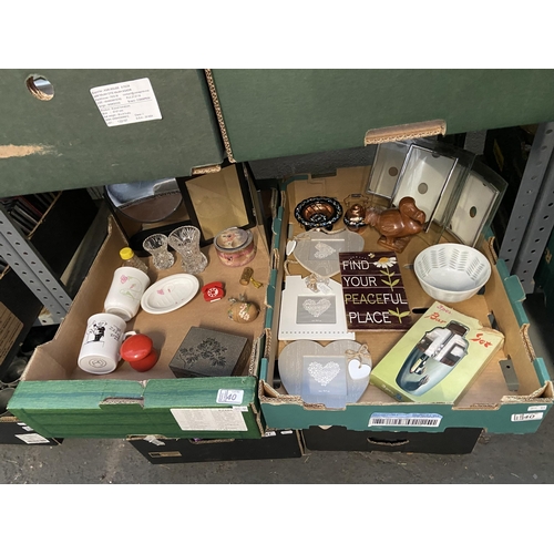 40 - 2 boxes containing an Oriental trinket box and wooden dodo etc