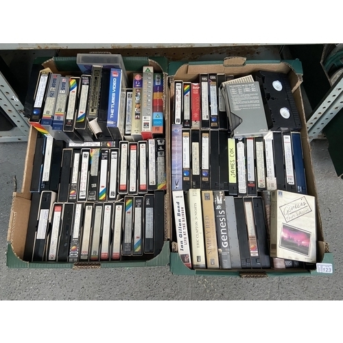 123 - 2 Boxes containing live music and promo VHS including Madonna, Tina Turner, Genesis