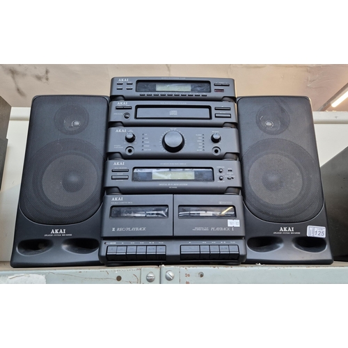 125 - Akai stereo and speaker system (SW-MX92)