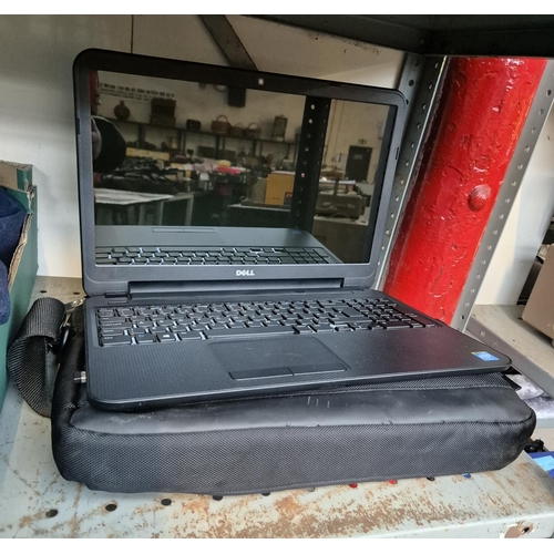 144 - Dell laptop and carry case (working)