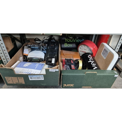 147 - 2 Boxes containing assorted electronics including radios, alarm clocks etc and stationery