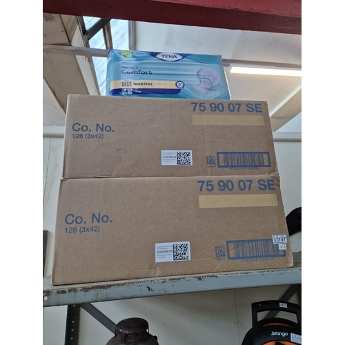 197 - 2 Boxes containing new Tena pads