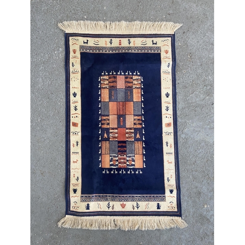 235 - Small ornate rug