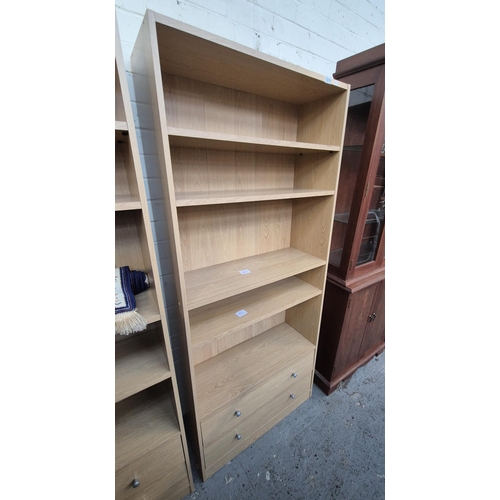 236 - Tall bookshelf with 2 drawers