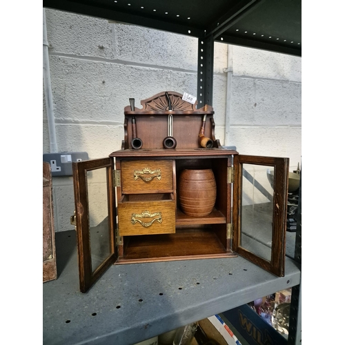 48 - Ornate smoker's cabinet with pipes