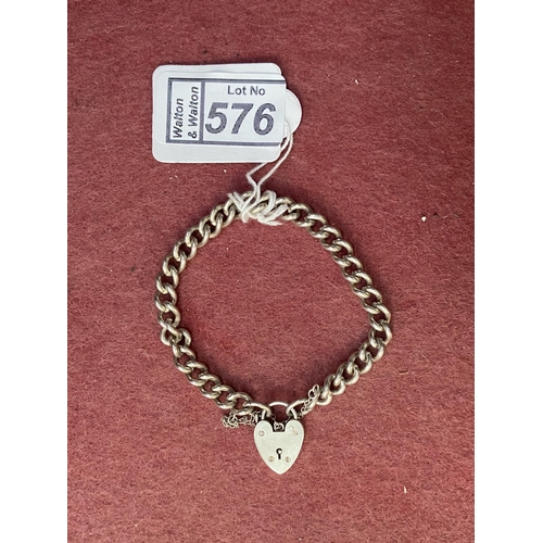 576 - Vintage silver curb bracelet with padlock clasp, 25g