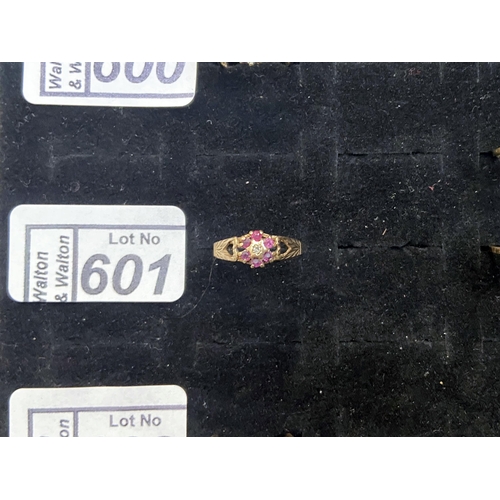 601 - 9ct gold diamond ruby ring, size P - Only 10% buyer's premium