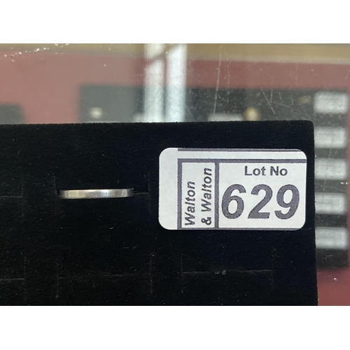 629 - 9ct White gold band, size J 1/2 - Only 10% buyer's premium