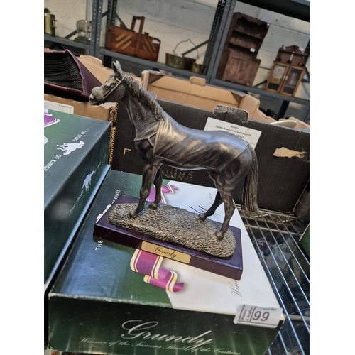 99 - 7 Boxed racehorse models including Seabiscuit